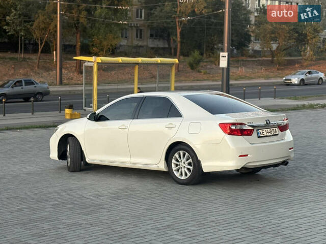Белый Тойота Камри, объемом двигателя 2.5 л и пробегом 101 тыс. км за 14200 $, фото 3 на Automoto.ua