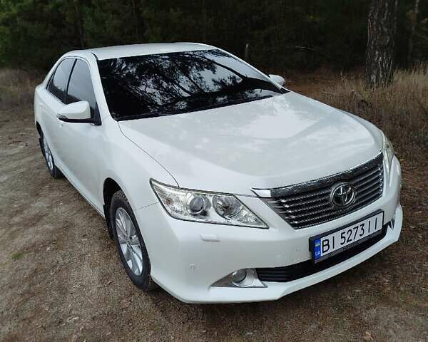 Білий Тойота Камрі, об'ємом двигуна 2.5 л та пробігом 196 тис. км за 11750 $, фото 6 на Automoto.ua