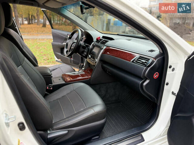 Белый Тойота Камри, объемом двигателя 2.49 л и пробегом 106 тыс. км за 12700 $, фото 18 на Automoto.ua