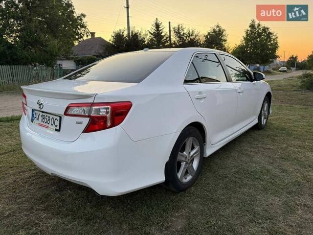 Белый Тойота Камри, объемом двигателя 2.49 л и пробегом 178 тыс. км за 10700 $, фото 4 на Automoto.ua