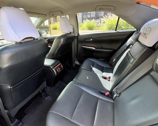 Белый Тойота Камри, объемом двигателя 2.5 л и пробегом 215 тыс. км за 16500 $, фото 6 на Automoto.ua
