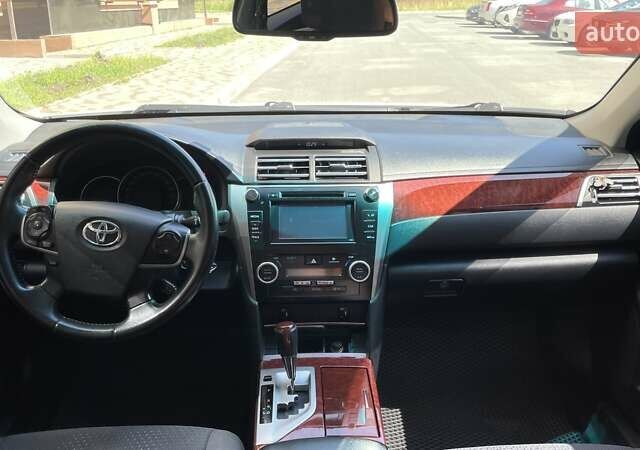 Белый Тойота Камри, объемом двигателя 2.49 л и пробегом 257 тыс. км за 12200 $, фото 8 на Automoto.ua