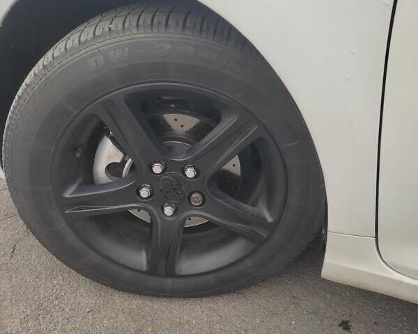 Белый Тойота Камри, объемом двигателя 2.4 л и пробегом 297 тыс. км за 10000 $, фото 5 на Automoto.ua