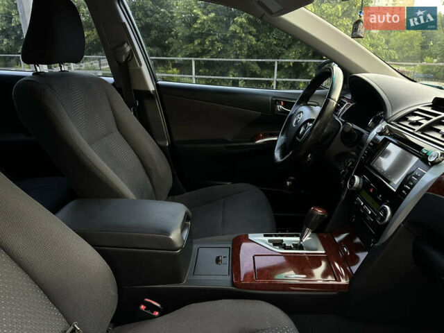 Білий Тойота Камрі, об'ємом двигуна 2.49 л та пробігом 315 тис. км за 12999 $, фото 14 на Automoto.ua