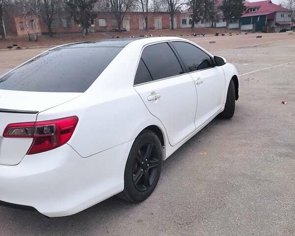 Белый Тойота Камри, объемом двигателя 2.4 л и пробегом 297 тыс. км за 10000 $, фото 9 на Automoto.ua