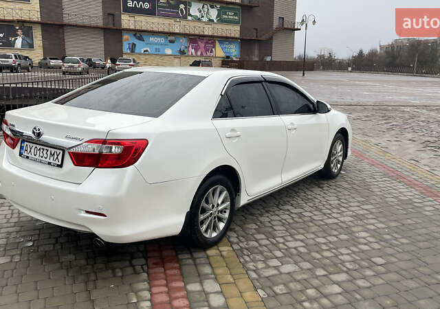 Белый Тойота Камри, объемом двигателя 2.5 л и пробегом 205 тыс. км за 14500 $, фото 4 на Automoto.ua