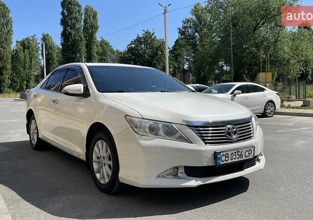 Белый Тойота Камри, объемом двигателя 2.49 л и пробегом 257 тыс. км за 12200 $, фото 2 на Automoto.ua