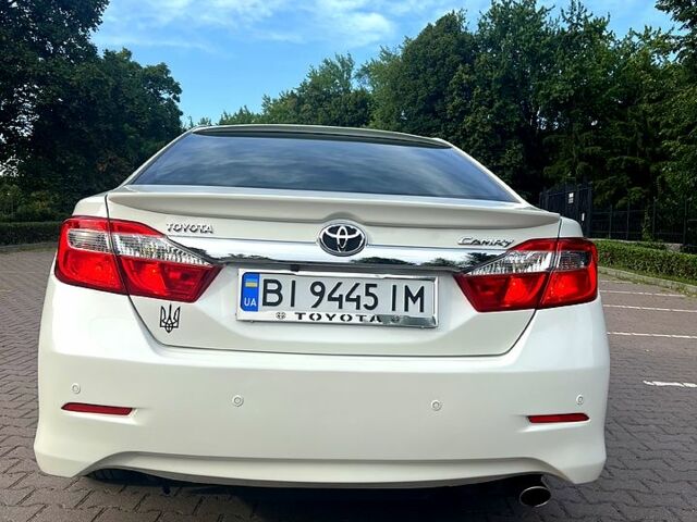Белый Тойота Камри, объемом двигателя 2.5 л и пробегом 120 тыс. км за 12500 $, фото 3 на Automoto.ua