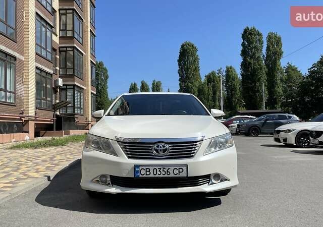 Белый Тойота Камри, объемом двигателя 2.49 л и пробегом 257 тыс. км за 12200 $, фото 1 на Automoto.ua