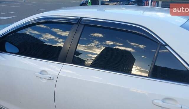 Білий Тойота Камрі, об'ємом двигуна 2.49 л та пробігом 258 тис. км за 9800 $, фото 9 на Automoto.ua