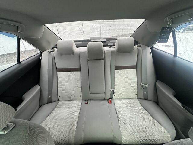 Белый Тойота Камри, объемом двигателя 2.5 л и пробегом 213 тыс. км за 9300 $, фото 6 на Automoto.ua