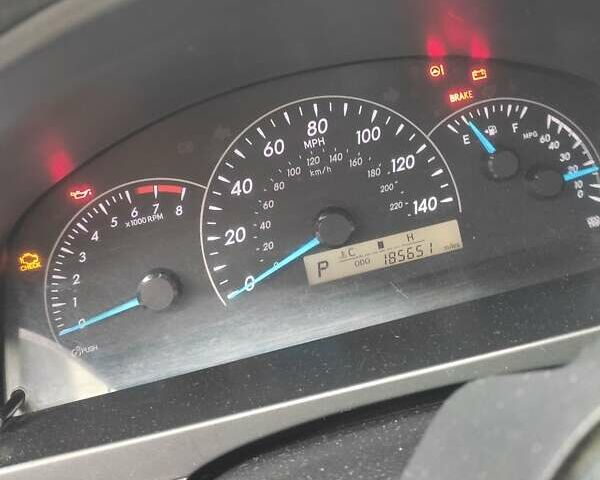 Белый Тойота Камри, объемом двигателя 2.4 л и пробегом 297 тыс. км за 10000 $, фото 11 на Automoto.ua