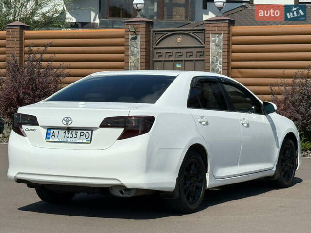 Белый Тойота Камри, объемом двигателя 2.49 л и пробегом 250 тыс. км за 10700 $, фото 21 на Automoto.ua