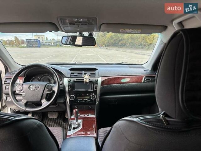 Белый Тойота Камри, объемом двигателя 2.5 л и пробегом 248 тыс. км за 12650 $, фото 14 на Automoto.ua