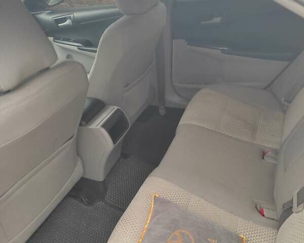 Белый Тойота Камри, объемом двигателя 2.4 л и пробегом 297 тыс. км за 10000 $, фото 12 на Automoto.ua