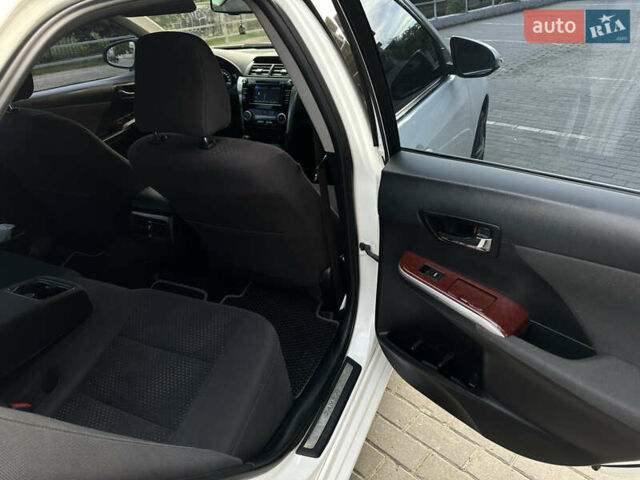 Білий Тойота Камрі, об'ємом двигуна 2.49 л та пробігом 315 тис. км за 12999 $, фото 16 на Automoto.ua