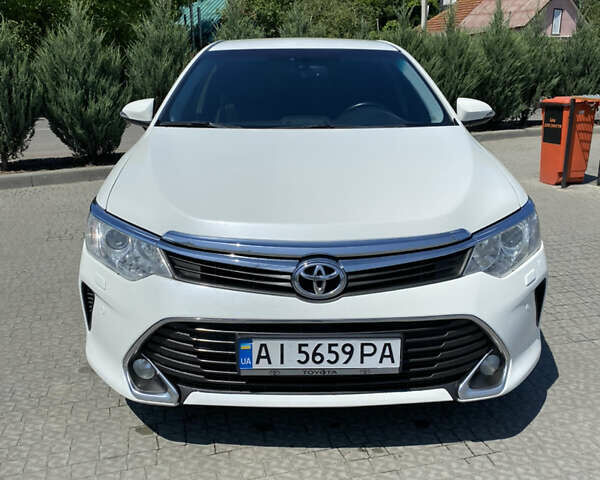 Тойота Камри 2014 в Полтаве на Automoto.ua Белый Тойота Камри, объемом двигателя 2.49 л и пробегом 203 тыс. км за 15800 $, фото 1 на Automoto.ua