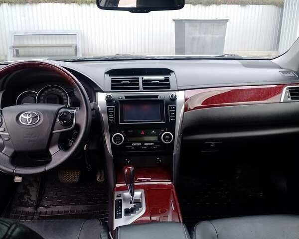 Белый Тойота Камри, объемом двигателя 2.5 л и пробегом 235 тыс. км за 13200 $, фото 6 на Automoto.ua