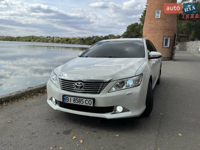 Белый Тойота Камри, объемом двигателя 2.49 л и пробегом 297 тыс. км за 14400 $, фото 8 на Automoto.ua