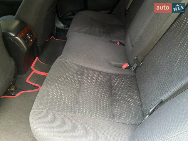 Белый Тойота Камри, объемом двигателя 2.49 л и пробегом 208 тыс. км за 12100 $, фото 10 на Automoto.ua