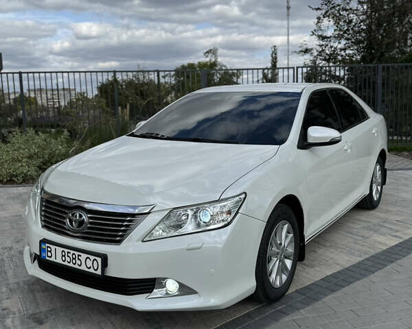 Белый Тойота Камри, объемом двигателя 2.49 л и пробегом 297 тыс. км за 14400 $, фото 11 на Automoto.ua