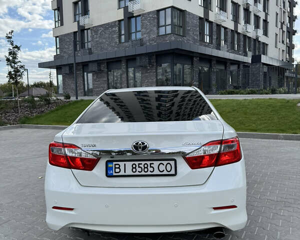 Белый Тойота Камри, объемом двигателя 2.49 л и пробегом 297 тыс. км за 14400 $, фото 13 на Automoto.ua