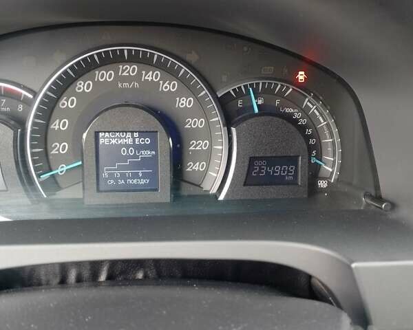 Белый Тойота Камри, объемом двигателя 2.5 л и пробегом 235 тыс. км за 13200 $, фото 4 на Automoto.ua