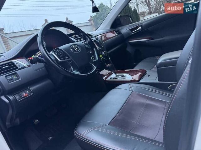 Білий Тойота Камрі, об'ємом двигуна 2.49 л та пробігом 155 тис. км за 14500 $, фото 29 на Automoto.ua