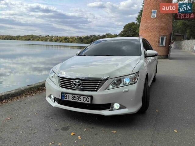 Белый Тойота Камри, объемом двигателя 2.5 л и пробегом 250 тыс. км за 13990 $, фото 5 на Automoto.ua