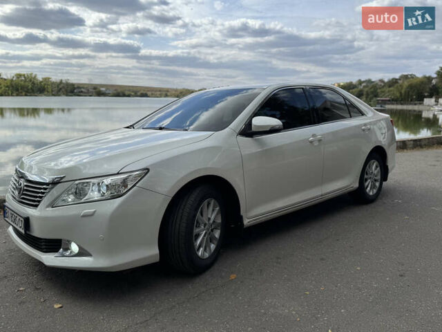 Белый Тойота Камри, объемом двигателя 2.49 л и пробегом 297 тыс. км за 14400 $, фото 7 на Automoto.ua