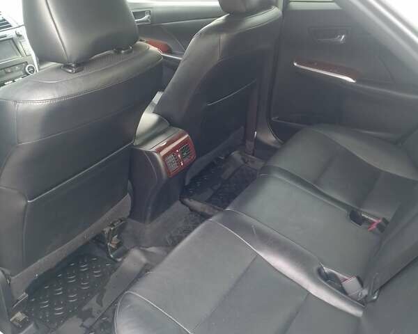 Белый Тойота Камри, объемом двигателя 2.5 л и пробегом 235 тыс. км за 13200 $, фото 3 на Automoto.ua