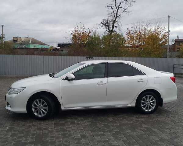Белый Тойота Камри, объемом двигателя 2.5 л и пробегом 235 тыс. км за 13200 $, фото 11 на Automoto.ua