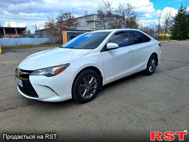 Белый Тойота Камри, объемом двигателя 2.5 л и пробегом 220 тыс. км за 12300 $, фото 3 на Automoto.ua