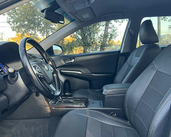 Тойота Камри 2015 в Кропивницком (Кировограде) на Automoto.ua Белый Тойота Камри, объемом двигателя 2.49 л и пробегом 230 тыс. км за 14800 $, фото 19 на Automoto.ua