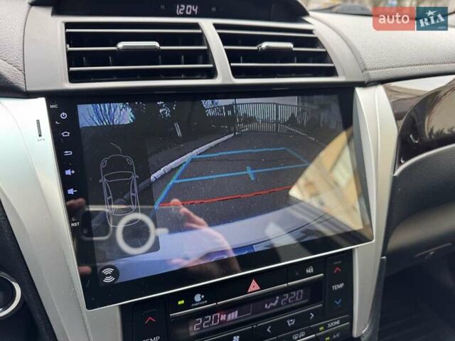 Белый Тойота Камри, объемом двигателя 2.49 л и пробегом 172 тыс. км за 17900 $, фото 33 на Automoto.ua