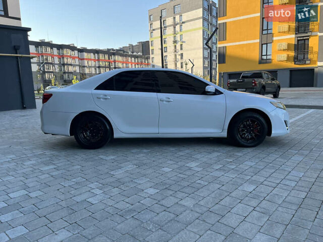 Белый Тойота Камри, объемом двигателя 2.49 л и пробегом 113 тыс. км за 13500 $, фото 13 на Automoto.ua