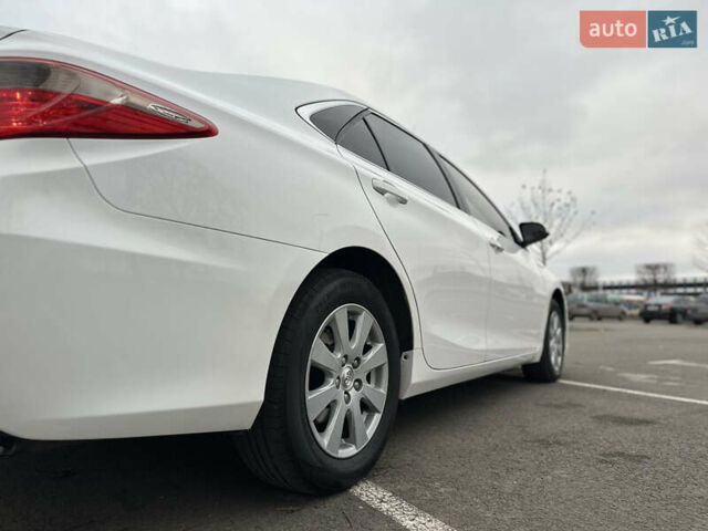 Білий Тойота Камрі, об'ємом двигуна 2.49 л та пробігом 241 тис. км за 13600 $, фото 16 на Automoto.ua