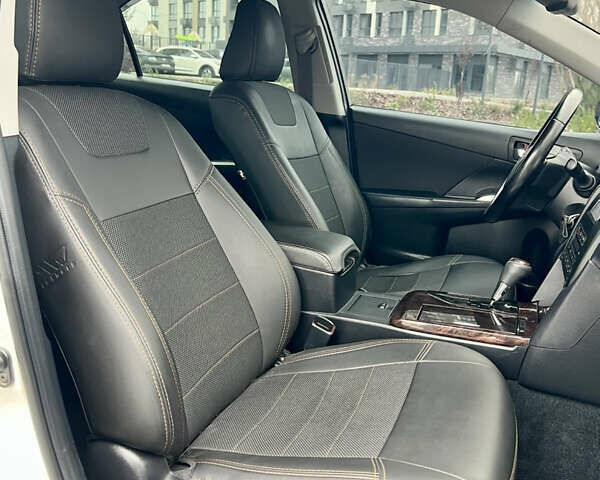 Белый Тойота Камри, объемом двигателя 2.49 л и пробегом 230 тыс. км за 14800 $, фото 23 на Automoto.ua