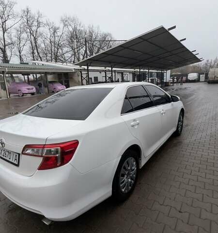 Белый Тойота Камри, объемом двигателя 2.49 л и пробегом 172 тыс. км за 9300 $, фото 4 на Automoto.ua
