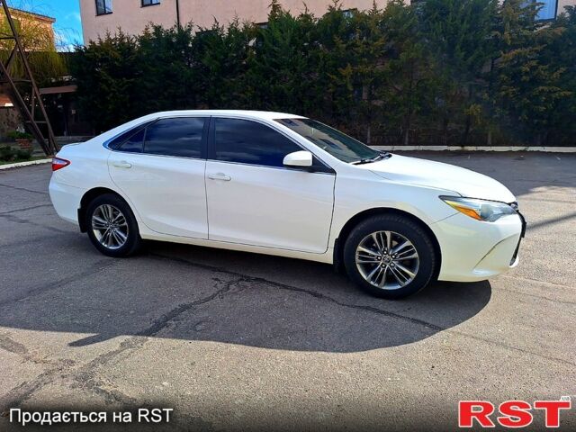 Белый Тойота Камри, объемом двигателя 2.5 л и пробегом 220 тыс. км за 12300 $, фото 6 на Automoto.ua