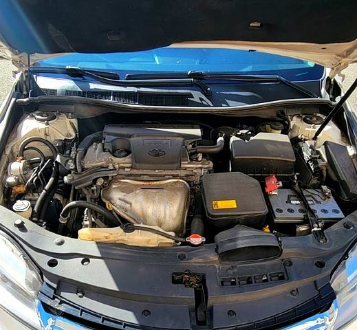 Белый Тойота Камри, объемом двигателя 2.5 л и пробегом 220 тыс. км за 13000 $, фото 1 на Automoto.ua