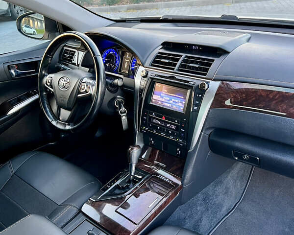 Тойота Камри 2015 в Кропивницком (Кировограде) на Automoto.ua Белый Тойота Камри, объемом двигателя 2.49 л и пробегом 230 тыс. км за 14800 $, фото 32 на Automoto.ua