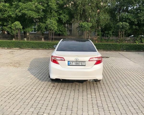 Белый Тойота Камри, объемом двигателя 2.5 л и пробегом 140 тыс. км за 11700 $, фото 3 на Automoto.ua