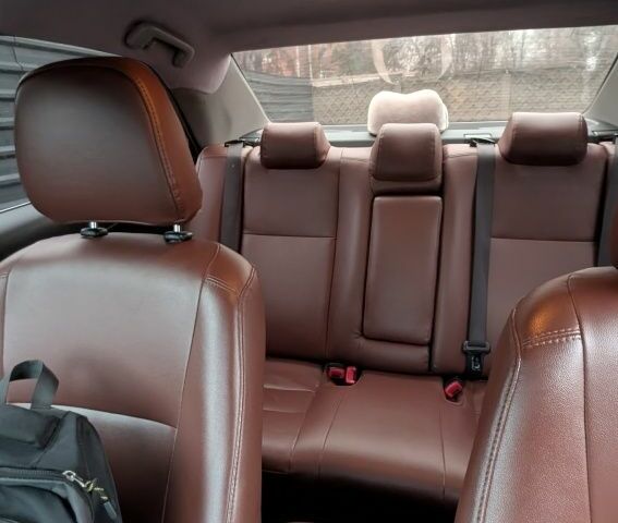 Белый Тойота Камри, объемом двигателя 2.5 л и пробегом 172 тыс. км за 9300 $, фото 2 на Automoto.ua