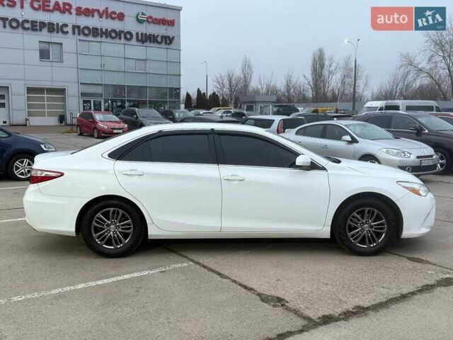 Белый Тойота Камри, объемом двигателя 2.49 л и пробегом 230 тыс. км за 11900 $, фото 3 на Automoto.ua