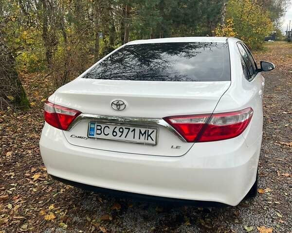 Белый Тойота Камри, объемом двигателя 2.5 л и пробегом 204 тыс. км за 13000 $, фото 7 на Automoto.ua