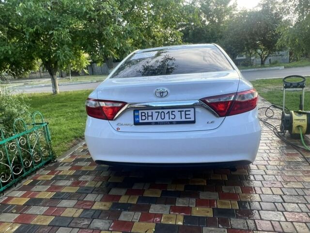 Белый Тойота Камри, объемом двигателя 2.5 л и пробегом 120 тыс. км за 12500 $, фото 2 на Automoto.ua
