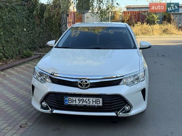 Белый Тойота Камри, объемом двигателя 2.49 л и пробегом 87 тыс. км за 18700 $, фото 22 на Automoto.ua