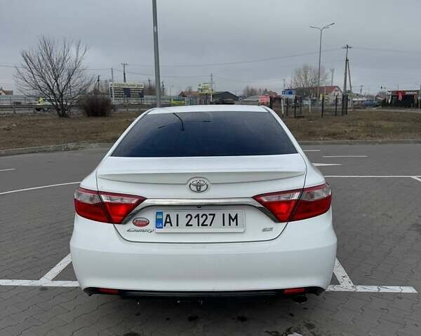 Белый Тойота Камри, объемом двигателя 2.49 л и пробегом 204 тыс. км за 12200 $, фото 1 на Automoto.ua