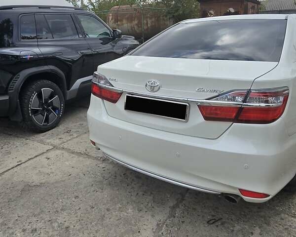 Белый Тойота Камри, объемом двигателя 2.49 л и пробегом 143 тыс. км за 20000 $, фото 12 на Automoto.ua